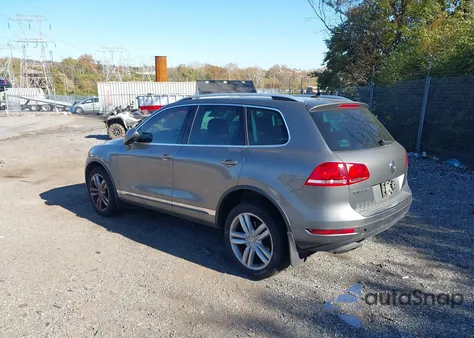 2012 Volkswagen Touareg Vr6 Executive z USA, uszkodzony, nr VIN WVGFF9BP3CD002132